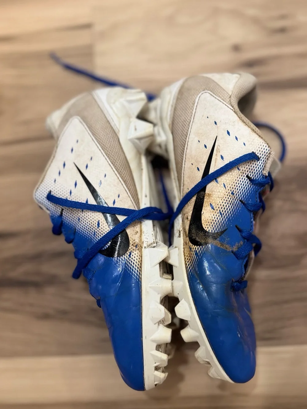 Nike Blue, White, and Black Kids football Cleats size 6